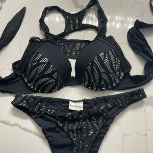 ******SOLD*****Beach Bunny live wire black iridescent.